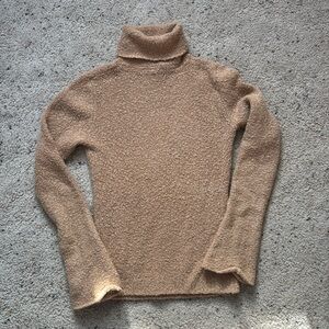 Tan turtleneck sweater